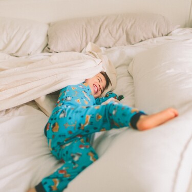 Toddler in a Queen Size Bed