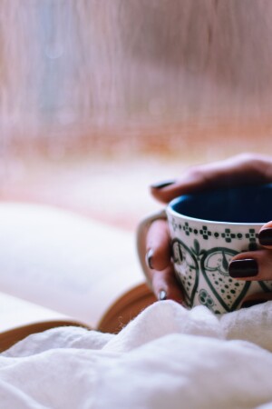 rainy day with good book cup of coffee or tea coronavirus covid-19 self care